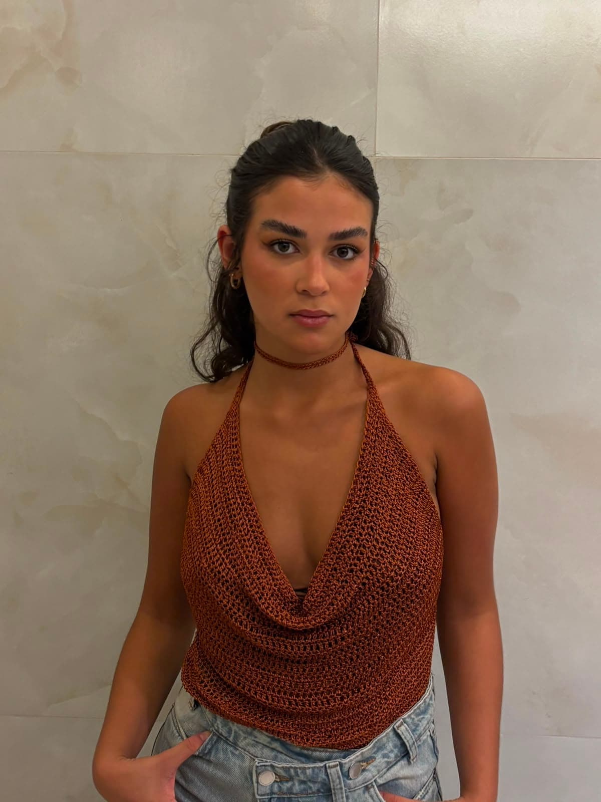 Nic, fundadora e artesã do ateliê